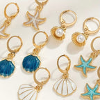 Boucles D’Oreilles Coquillage Dorées Avec Perle Élégante